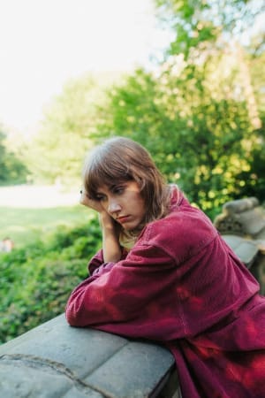 Female thinking about the past - Image by Victoria Romulo